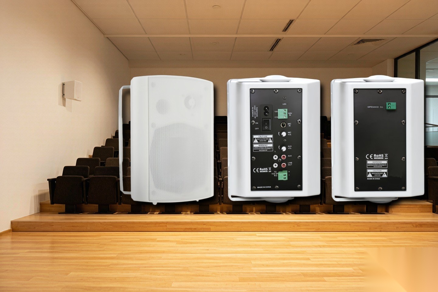 GoFutura wall-mount speaker installed in a lecture hall
